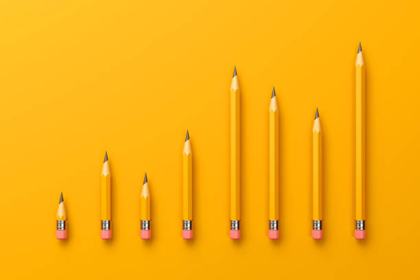 istock 2B Pencils Forming A Bar Graph on Yellow Background 1160400514
