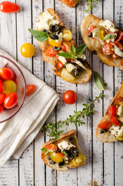 istock Crostini with tomatoes and olives 1160409991