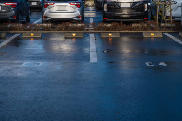 istock row of cars in parking 1160410077