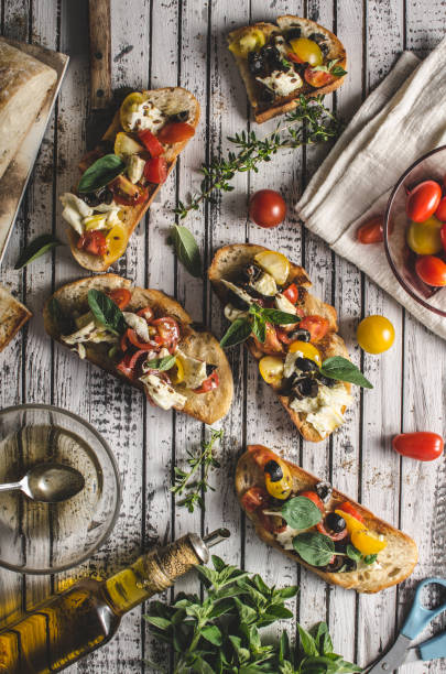 istock Crostini with tomatoes and olives 1160410574