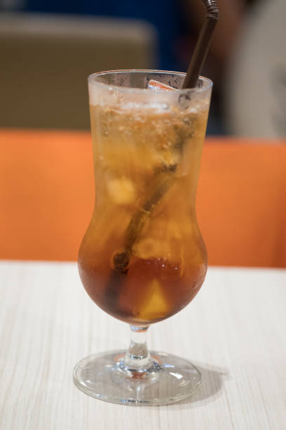 istock Glass of lemon cold iced tea on table 1160410646