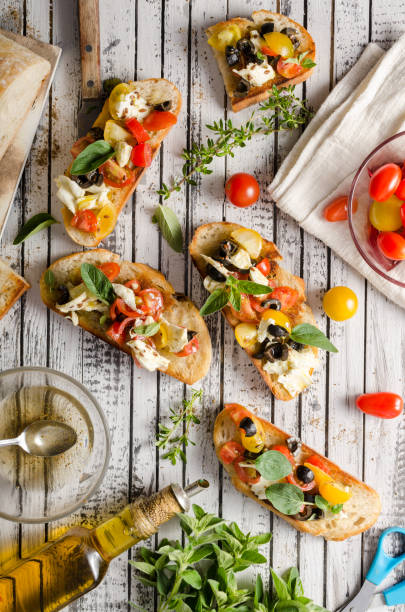 istock Crostini with tomatoes and olives 1160410757