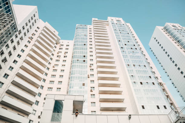 istock White new modern skyscrapers. New luxury residential complex. Texture, background. 1160411823