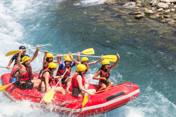 istock Group of people white water rafting 1160412084