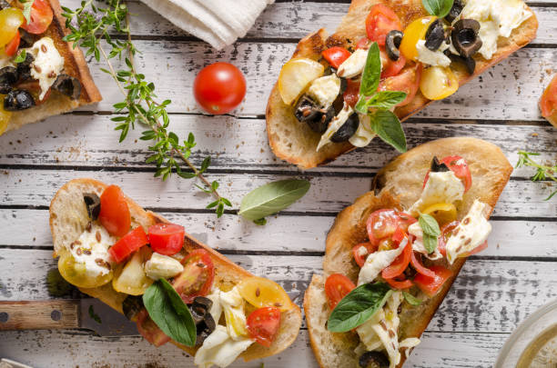 istock Crostini with tomatoes and olives 1160412156