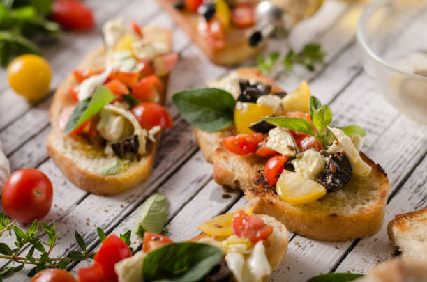 istock Crostini with tomatoes and olives 1160412163