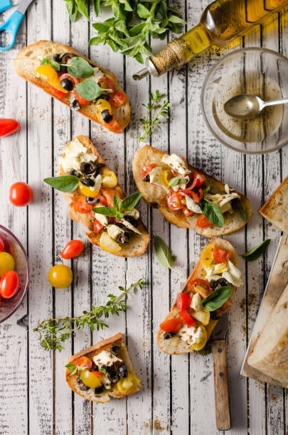 istock Crostini with tomatoes and olives 1160413118