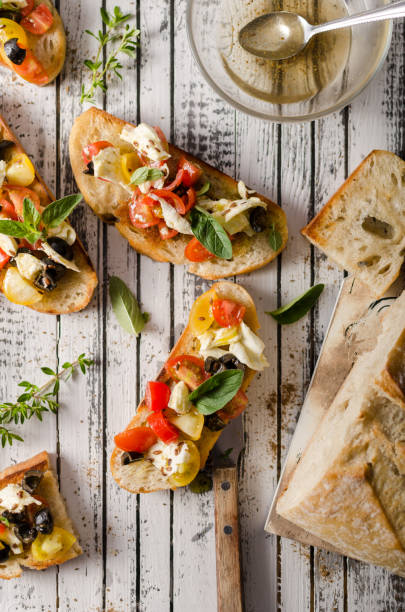 istock Crostini with tomatoes and olives 1160413310
