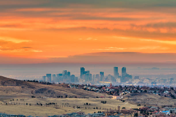 Denver, Colorado, USA downtown Denver, Colorado, USA downtown skyline viewed from Red Rocks at dawn. morrison stock pictures, royalty-free photos & images