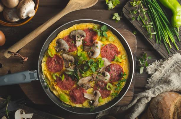 istock Homemade delish egg omelette with salami 1160417102