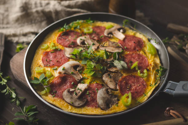 istock Homemade delish egg omelette with salami 1160417249