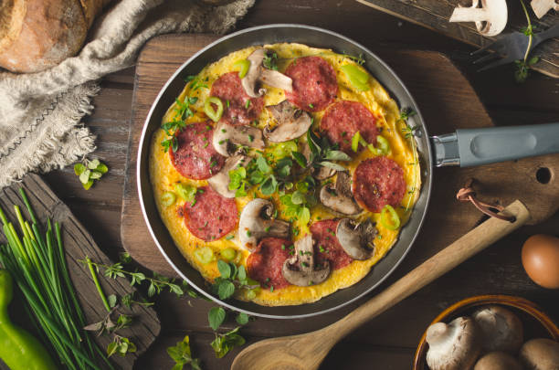 istock Homemade delish egg omelette with salami 1160417950