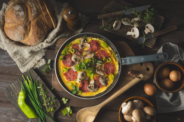 istock Homemade delish egg omelette with salami 1160418024