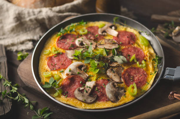 istock Homemade delish egg omelette with salami 1160418115