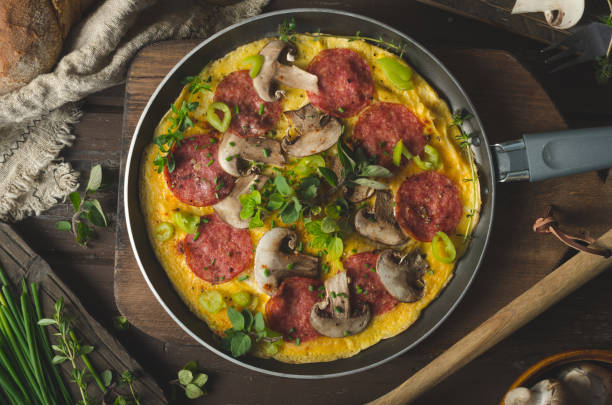 istock Homemade delish egg omelette with salami 1160418250