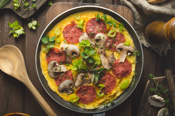 istock Homemade delish egg omelette with salami 1160418326