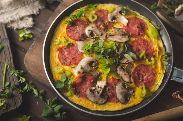 istock Homemade delish egg omelette with salami 1160418374