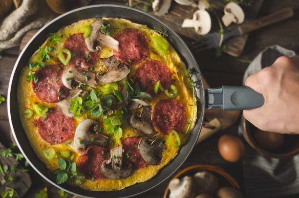 istock Homemade delish egg omelette with salami 1160418413