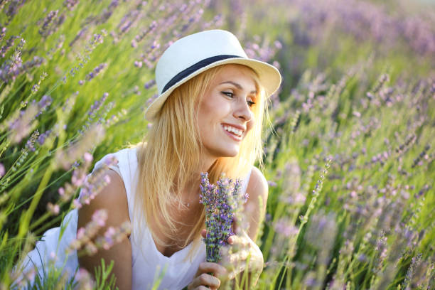 istock Smiling woman in a lavender field 1160418488