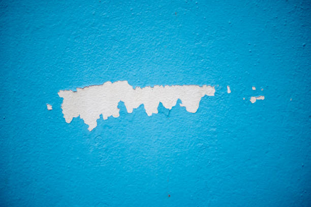 Blue color wall and cracked background