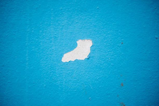 Blue color wall and cracked background