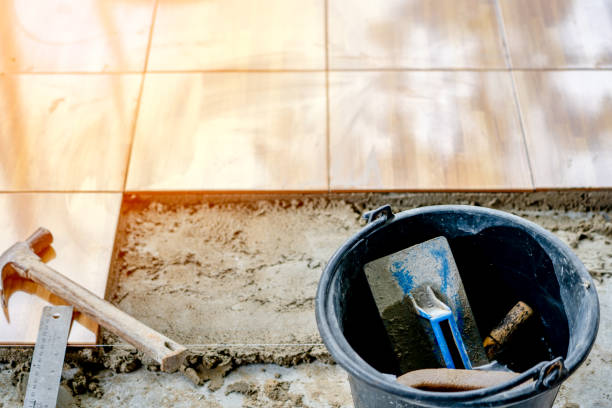 istock instrument for improvemet ceramic floor building in working 1160419747