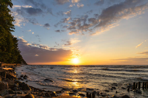 istock bright summer sunset near the sea 1160419783