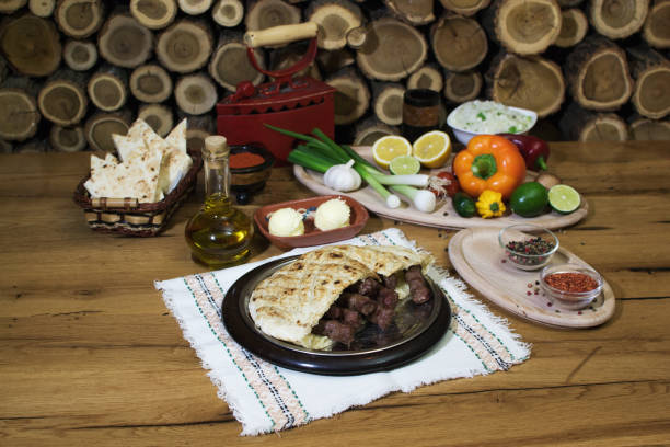 istock Kebabs - grilled meat, bread and vegetables. 1160420727