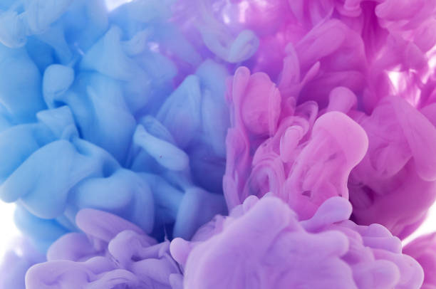istock Ink in water. Splash paint mixing. Multicolored liquid dye. Abstract background color 1160424897