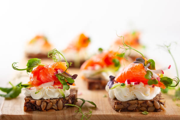 istock Mini canapes with smoked salmon 1160425118