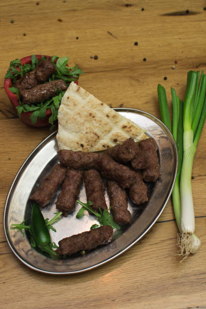 istock Kebabs - grilled meat, bread and vegetables. 1160425130