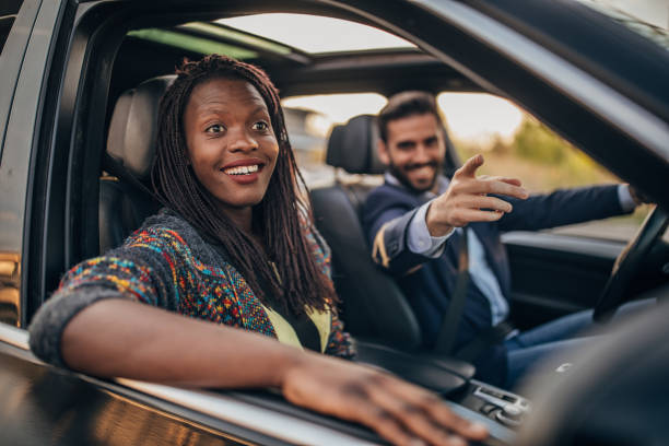 istock People driving in a car 1160426449