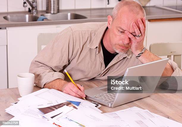 Man Trying To Pay The Bills Stock Photo - Download Image Now - Deadline, Financial Bill, Frustration