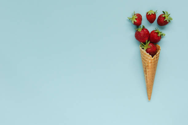 istock Ripe organic strawberries in waffle ice cream cones 1160427595