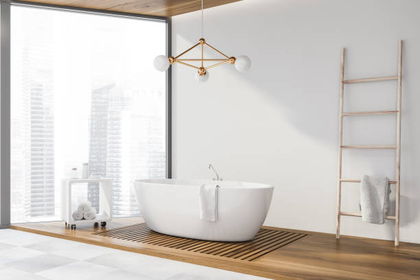 istock Wood floor bathroom corner with tub 1160427968