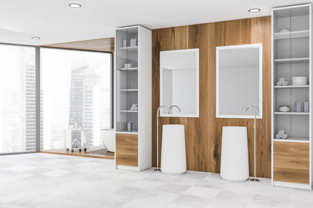 istock Wooden bathroom corner with two sinks and tub 1160428735
