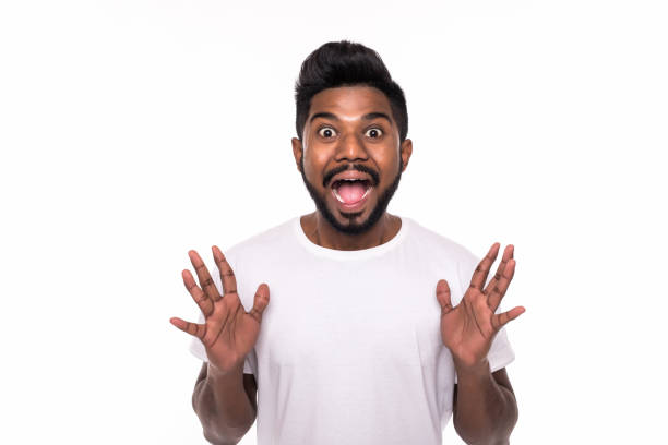 istock Surprised handsome young indian man shocked not believing his eyes looking at camera. Breaking news concept 1160429177