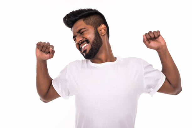 istock Young indian man stretching his arms isolated on white background 1160429919