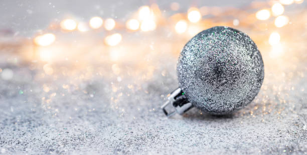 istock Christmas Composition decorations and garlands on a brilliant background 1160433157