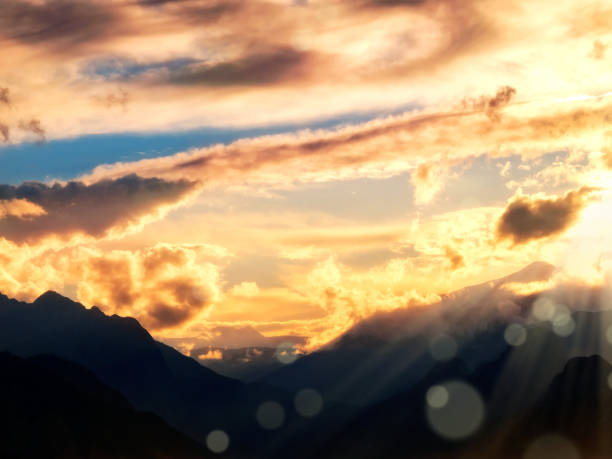 istock landscape image of high mountains over cloudy sunset sky 1160433262