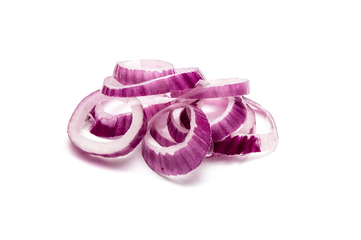 Red onion rings isolated on white background