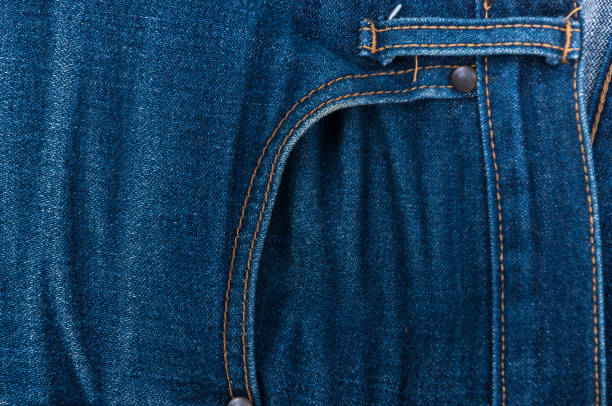 front pockets of jeans,isolation of jeans,texture background - metal stud imagens e fotografias de stock