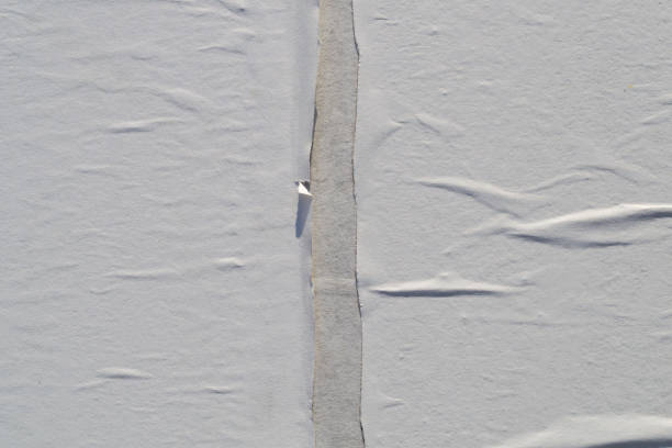 istock White creased poster texture. Abstract background. 1160438057