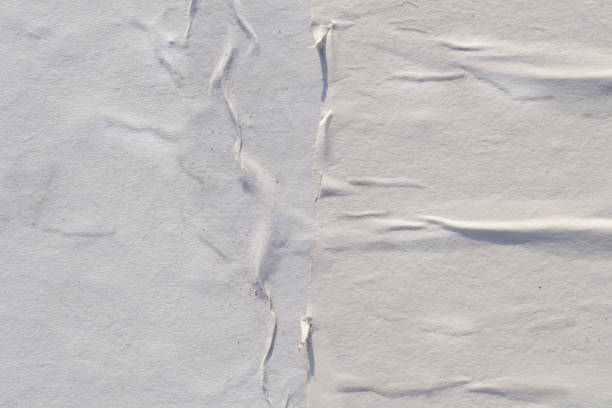 istock White creased poster texture. Abstract background. 1160438061