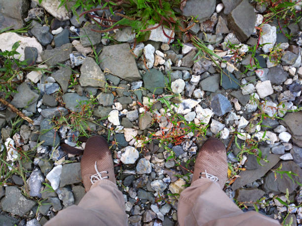 istock Feet on the stones. 1160442227
