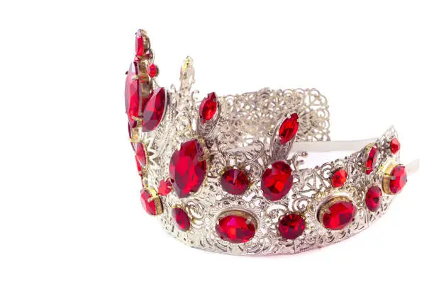 Photo of Crown on a white background, handmade, custom-made, individually, jewelry for princesses. Side view left side