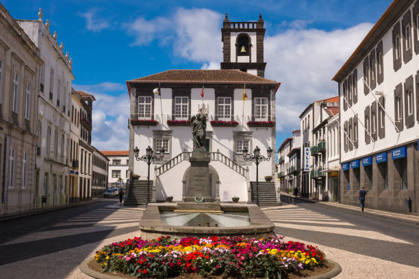ponta delgada city hall. beautiful baroque building"r"nwith a bell tower in the capital of the azores. portugal, sao miguel. - ponta delgada imagens e fotografias de stock