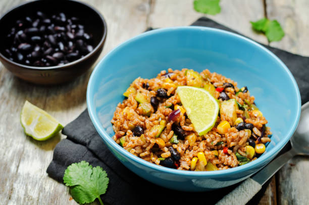 istock Black beans pepper cilantro zucchini  lime brown rice 1160445291