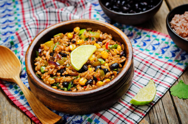 istock Black beans pepper cilantro zucchini  lime brown rice 1160445292