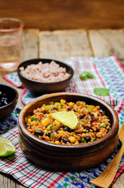 istock Black beans pepper cilantro zucchini  lime brown rice 1160445293